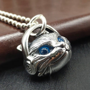 Colgante cabeza de gato ojos azules plata esterlina 925
