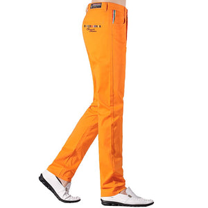 Pantalones chinos bordados tiburón 97% Algodón elástico para hombre azul y naranja. 28-40