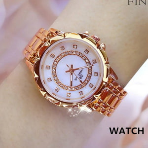 Elegante reloj femenino con diamantes artificiales. Acero inoxidable. 32mm 