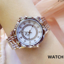 Cargar imagen en el visor de la galería, Elegante reloj femenino con diamantes artificiales. Acero inoxidable. 32mm 