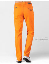 Cargar imagen en el visor de la galería, Pantalones chinos bordados tiburón 97% Algodón elástico para hombre azul y naranja. 28-40