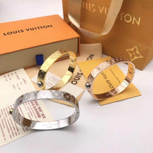 Cargar imagen en el visor de la galería, Pulseras Louis Vuitton unisex color plata y oro. 