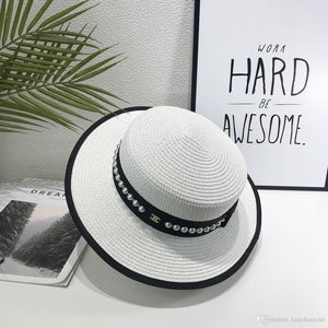 2019 nueva marca de moda masculina y femenina sombrero para el sol diseñador sombrero para el sol viaje en la playa masculina y femenina sombrero de paja cuadro correspondiente
