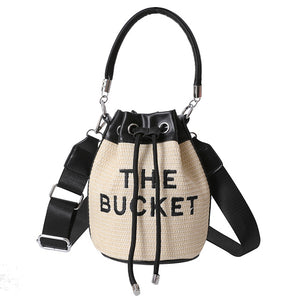 The Bucket en colores paja y PU.